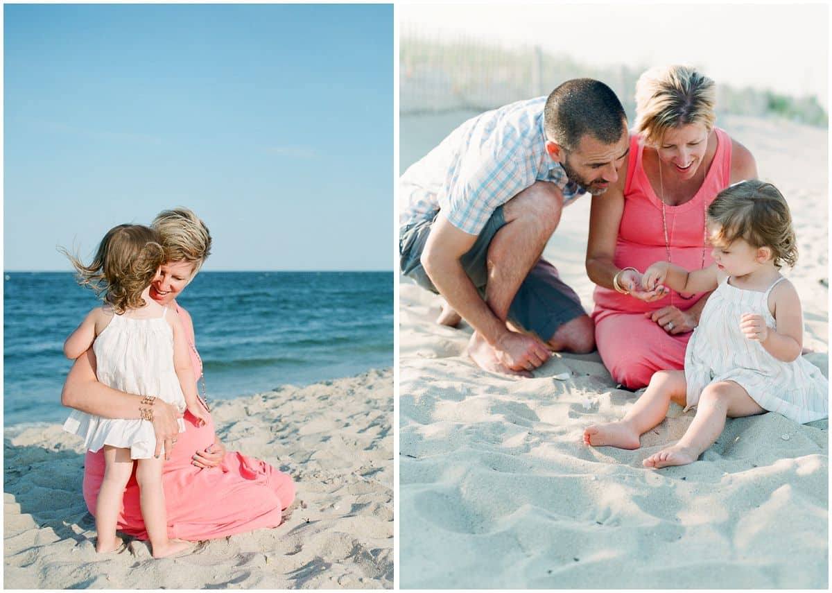 maternity photography with parents and little daughter playing with sand at Sandy Hook Beach 