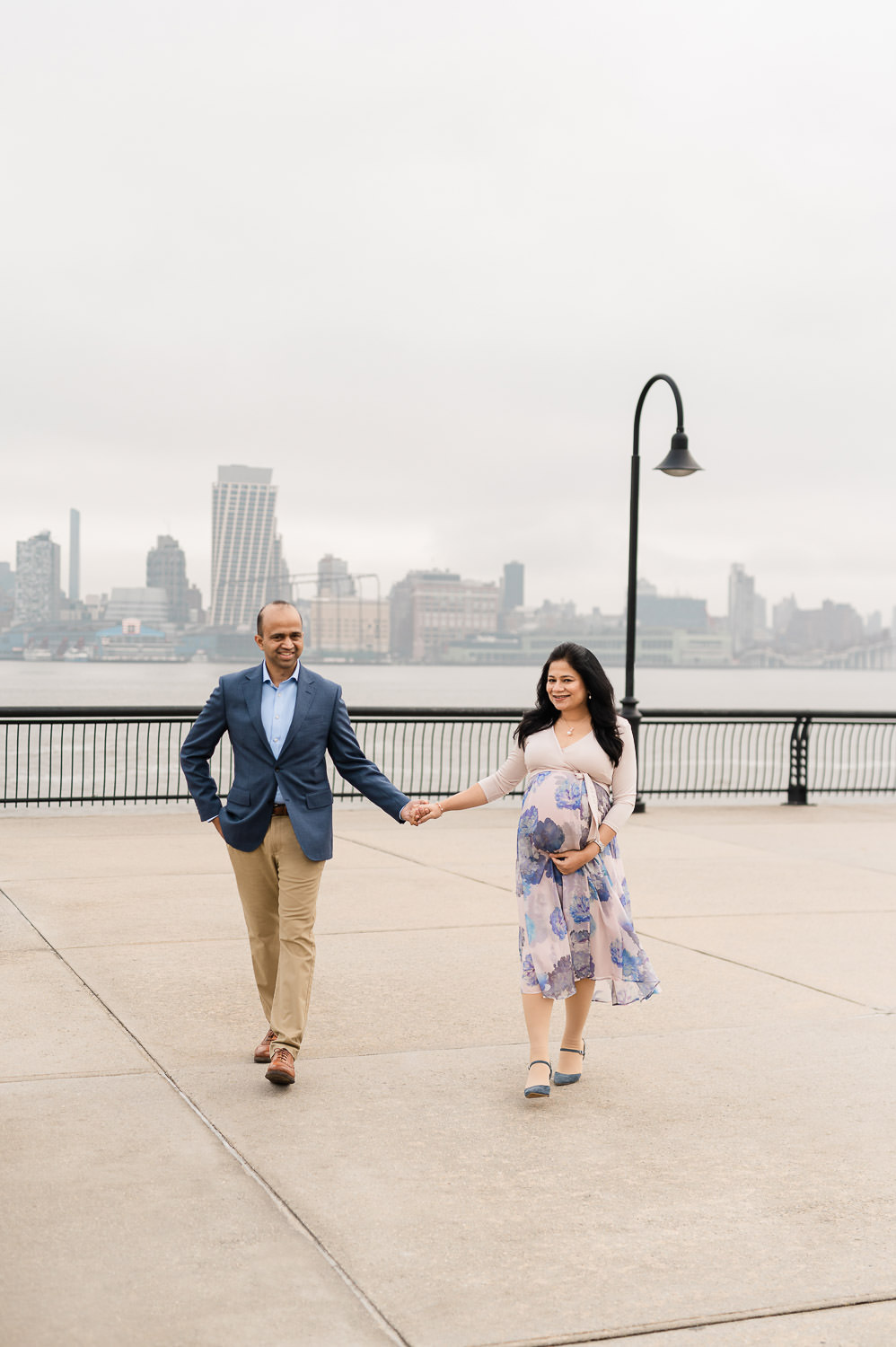 Maternity photography NYC session at Hoboken waterfront with Manhattan skyline