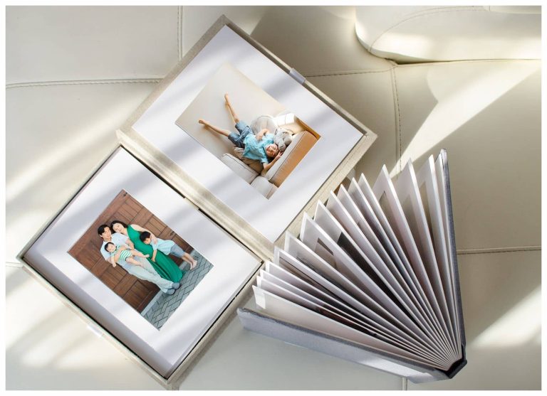 Fine art prints of a young family with two kids wearing neutral and green, captured in a family photography NYC session