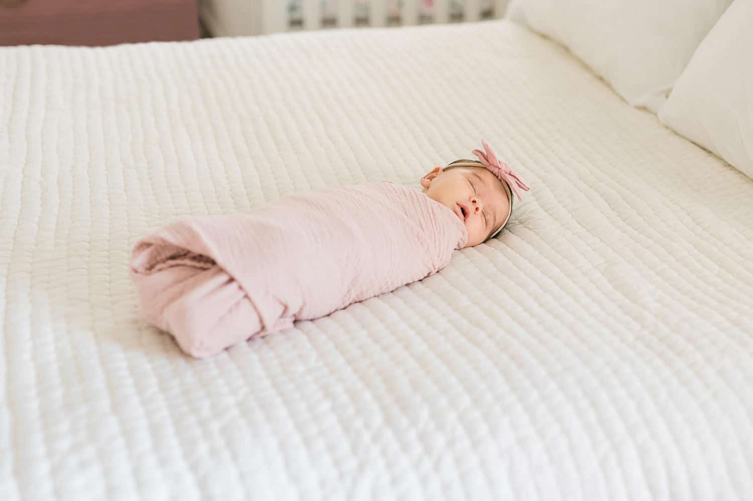 Newborn baby sleeping peacefully during Upper East Side in-home photography session
