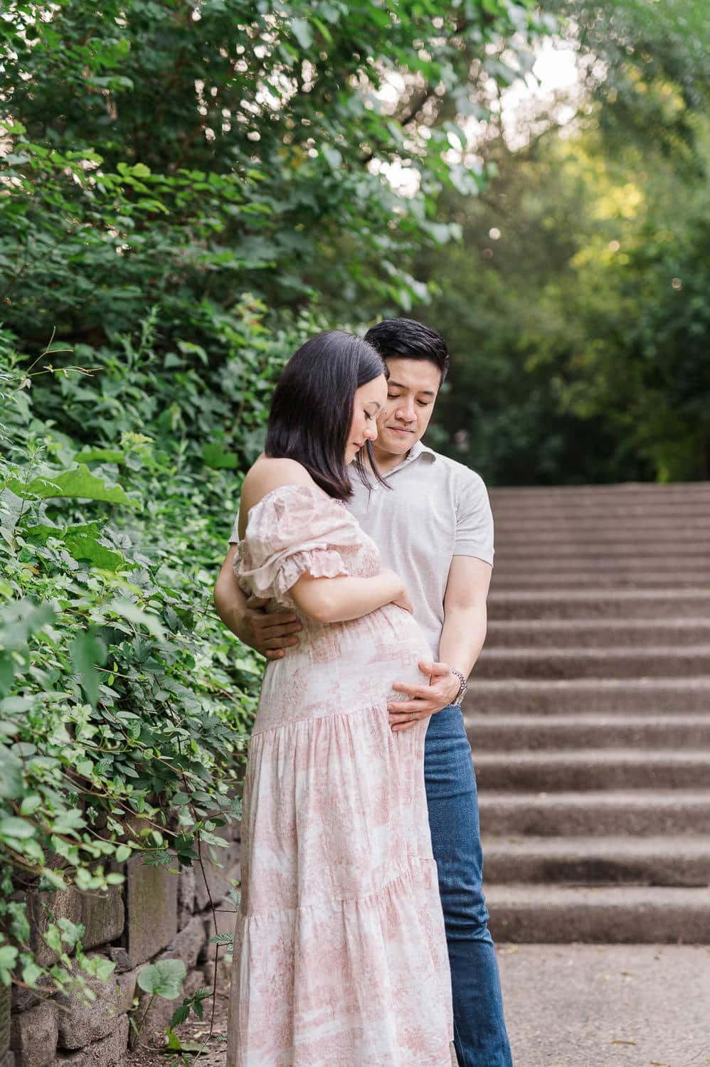 Candid Park Slope maternity portraits with pets in natural park setting