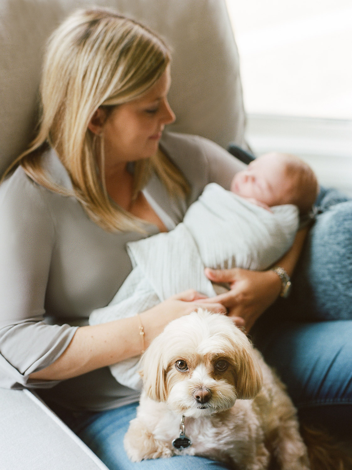 Mom with her baby and dog, how to choose newborn photographer in NJ