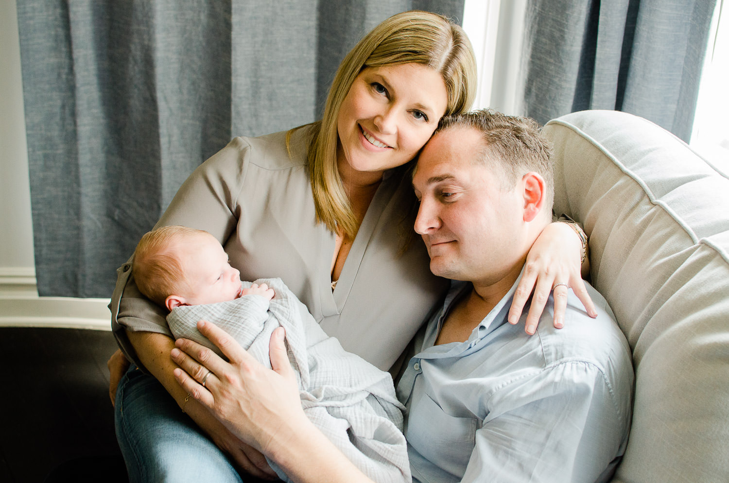 parents with newborn baby boy during in-home session NJ